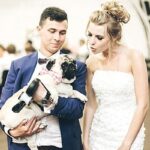bride and groom with pug dog